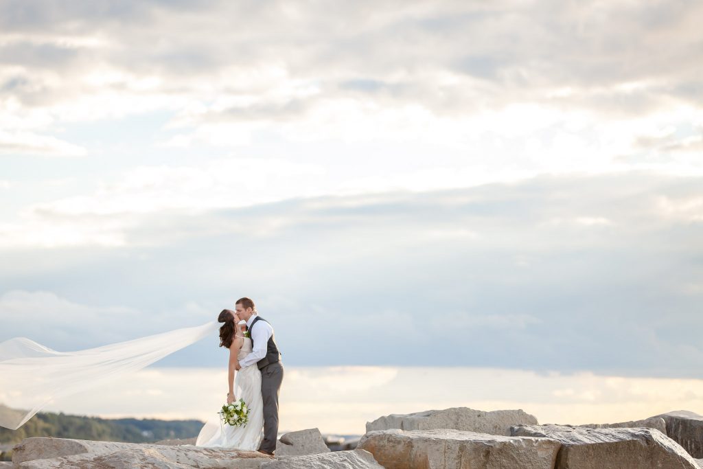 Couple Kissing in New Buffalo Beach - New Buffalo Michigan Wedding Photographer - Toni Jay Photography